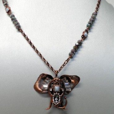 Sautoir Reminiscence collection Jungle Fever en metal cuivre , Resine et Cristal